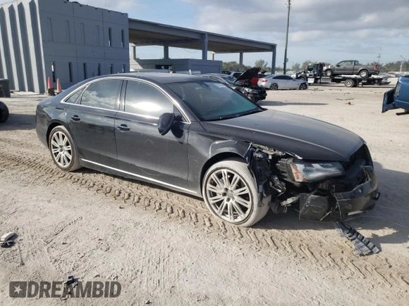 2013 Audi A8 3.0L with VIN WAUAGAFDXDN032766, listed as a Copart auction lot 84275944 with 127,388 mi miles and Salvage title. Bid and sale history available at DreamBid. Image 4.