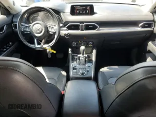 2018 Mazda CX-5 Grand Touring with VIN JM3KFBDM4J0348165, listed as a Copart auction lot 62733665 with 80,693 mi miles and Salvage title. Bid and sale history available at DreamBid. Image 8.