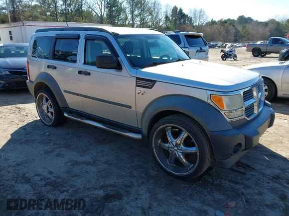 2007 Dodge Nitro SXT with VIN 1D8GT28K97W642118, listed as a IAAI auction lot 41276172 with 385,441 mi miles. Bid and sale history available at carsss.com. Image 1.