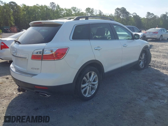 2011 Mazda CX-9 Grand Touring with VIN JM3TB2DA4B0305811, listed as a IAAI auction lot 42092829 with 232,298 mi miles and . Bid and sale history available at DreamBid. Image 4.