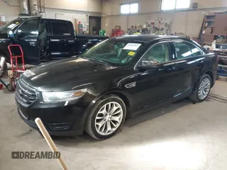 2015 Ford Taurus Limited with VIN 1FAHP2J87FG172580, listed as a IAAI auction lot 41891567 with 183,784 mi miles. Bid and sale history available at carsss.com. Image 17.