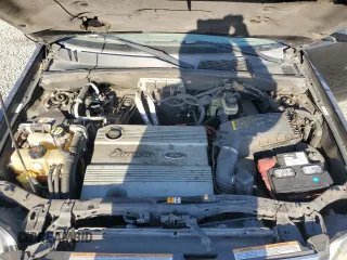 2008 Mercury Mariner with VIN 4M2CU29H68KJ36634, listed as a Copart auction lot 84690984 with 233,490 mi miles and Salvage Title. Bid and sale history available at carsss.com. Image 13.