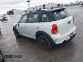 2013 MINI Countryman S ALL4 with VIN WMWZC5C50DWP30199, listed as a IAAI auction lot 42399104 with 103,367 mi miles and . Bid and sale history available at DreamBid. Image 3.