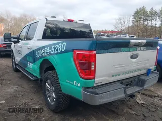 2021 Ford F-150 XL with VIN 1FTEW1EPXMFC83574, listed as a IAAI auction lot 41694174 with 57,814 mi miles. Bid and sale history available at carsss.com. Image 3.