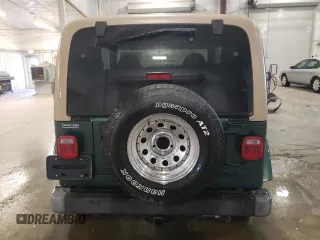 2000 Jeep Wrangler Sahara with VIN 1J4FA59S2YP778631, listed as a Copart auction lot 54313665 with 160,683 mi miles and Salvage Title. Bid and sale history available at carsss.com. Image 6.
