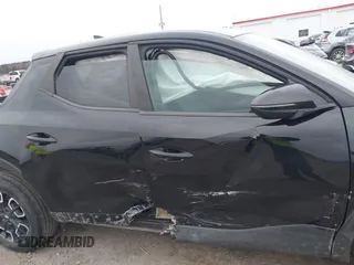 2022 Hyundai Santa Cruz SEL z VIN 5NTJBDAE5NH008011, wystawiony jako IAAI lot #41614699 z przebiegiem 57 484 mil mil oraz . Historia ofert i sprzedaży dostępna na DreamBid. Obrazek 13.