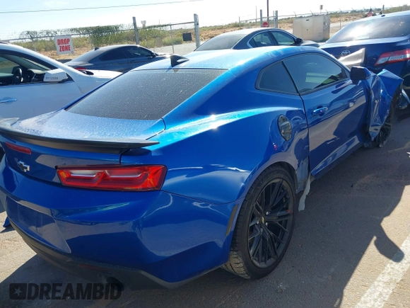 2017 Chevrolet Camaro 1LT z VIN 1G1FB1RS2H0158584, wystawiony jako IAAI lot #40488502 z przebiegiem 92 684 mil mil oraz . Historia ofert i sprzedaży dostępna na DreamBid. Obrazek 13.