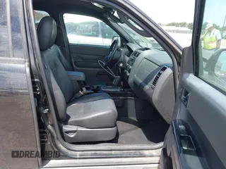 2011 Ford Escape Limited with VIN 1FMCU0EG9BKC66966, listed as a IAAI auction lot 42627832 with 154,101 mi miles and . Bid and sale history available at DreamBid. Image 5.