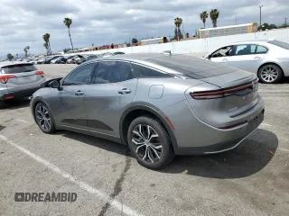 2024 Toyota Crown XLE with VIN JTDAAAAF3R3028736, listed as a Copart auction lot 50544405 with 52,117 mi miles and Salvage title. Bid and sale history available at DreamBid. Image 2.