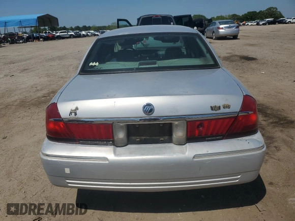 1999 Mercury Grand Marquis LS z VIN 2MEFM75W5XX673218, wystawiony jako Copart lot #52621285 z przebiegiem 163 642 mil mil oraz Szkoda całkowita • Salvage title. Historia ofert i sprzedaży dostępna na DreamBid. Obrazek 6.