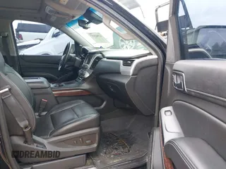 2015 GMC Yukon SLT with VIN 1GKS1BKC5FR274408, listed as a IAAI auction lot 41942157 with 165,978 mi miles. Bid and sale history available at carsss.com. Image 5.