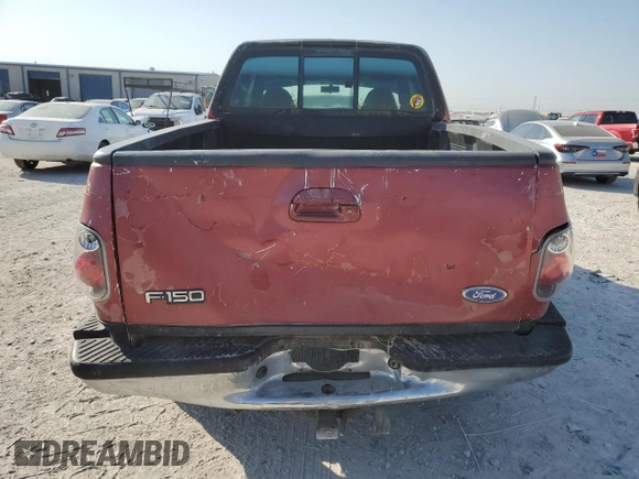 1997 Ford F-150 XL with VIN 1FTDX0721VKC14947, listed as a Copart auction lot 74887414 with 157,811 mi miles and Salvage title. Bid and sale history available at DreamBid. Image 6.