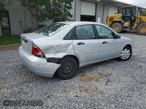 2005 Ford Focus S with VIN 1FAFP34N55W115653, listed as a Copart auction lot 63043315 with 110,593 mi miles and Salvage title. Bid and sale history available at DreamBid. Image 3.