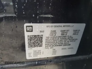 2022 Cadillac XT4 FWD Premium Luxury z VIN 1GYFZCR44NF166169, wystawiony jako Copart lot #77981414 z przebiegiem 9 734 mil mil oraz Nie do naprawy • Non repairable. Historia ofert i sprzedaży dostępna na DreamBid. Obrazek 14.