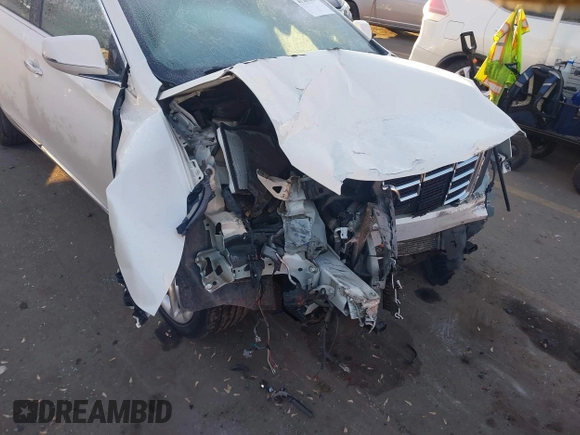 2014 Cadillac XTS Premium with VIN 2G61P5S30E9123057, listed as a IAAI auction lot 41301457 with 123,042 mi miles and . Bid and sale history available at DreamBid. Image 6.