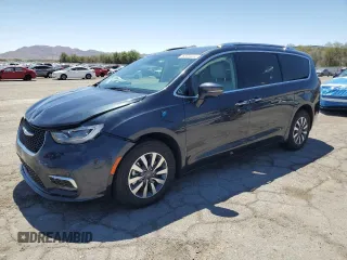 2021 Chrysler Pacifica Hybrid Touring L with VIN 2C4RC1L73MR593958, listed as a Copart auction lot 63784635 with 80,330 mi miles and Salvage title. Bid and sale history available at DreamBid. Image 1.