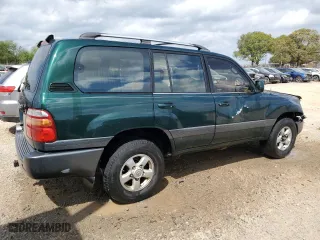 1999 Toyota Land Cruiser with VIN JT3HT05J1X0051145, listed as a Copart auction lot 51969335 with 289,702 mi miles and Salvage Title. Bid and sale history available at carsss.com. Image 3.
