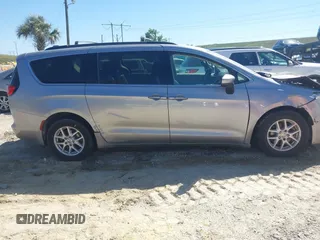 2021 Chrysler Voyager LXi z VIN 2C4RC1DG3MR520653, wystawiony jako IAAI lot #41724784 z przebiegiem 139 193 mil mil oraz . Historia ofert i sprzedaży dostępna na DreamBid. Obrazek 13.