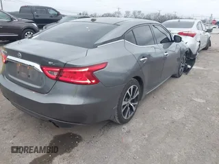 2016 Nissan Maxima SL with VIN 1N4AA6AP0GC424793, listed as a IAAI auction lot 40922109 with 135,974 mi miles and . Bid and sale history available at DreamBid. Image 4.