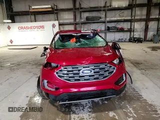 2020 Ford Edge SEL z VIN 2FMPK4J97LBA08950, wystawiony jako Copart lot #49695335 z przebiegiem Nie podano mil oraz Szkoda całkowita • Salvage title. Historia ofert i sprzedaży dostępna na DreamBid. Obrazek 11.