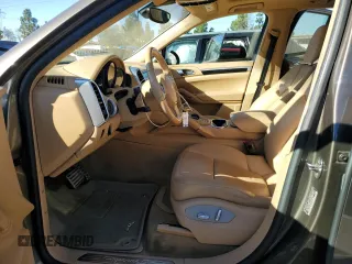 2014 Porsche Cayenne S Hybrid with VIN WP1AE2A2XELA50071, listed as a Copart auction lot 83904494 with 76,436 mi miles and Salvage title. Bid and sale history available at DreamBid. Image 7.