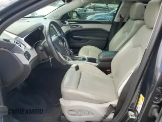 2015 Cadillac SRX Luxury Collection z VIN 3GYFNBE31FS598363, wystawiony jako Copart lot #55766975 z przebiegiem 62 103 mil mil oraz Szkody całkowita. Historia ofert i sprzedaży dostępna na DreamBid. Obrazek 7.