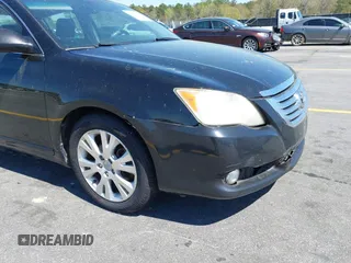 2010 Toyota Avalon XL with VIN 4T1BK3DBXAU361354, listed as a IAAI auction lot 41863124 with 163,625 mi miles and . Bid and sale history available at DreamBid. Image 18.