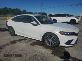2022 Honda Civic Touring z VIN 2HGFE1F99NH301331, wystawiony jako Copart lot #57138065 z przebiegiem 77 788 mil mil oraz Szkoda całkowita • Salvage title. Historia ofert i sprzedaży dostępna na DreamBid. Obrazek 4.