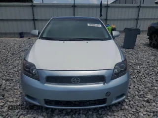 2006 Scion tC z VIN JTKDE167560101159, wystawiony jako Copart lot #58065315 z przebiegiem 136 428 mil mil oraz Szkoda całkowita • Salvage title. Historia ofert i sprzedaży dostępna na DreamBid. Obrazek 5.