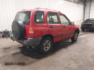 2001 Chevrolet Tracker z VIN 2CNBJ13C116953953, wystawiony jako IAAI lot #42107350 z przebiegiem 185 898 mil mil oraz . Historia ofert i sprzedaży dostępna na DreamBid. Obrazek 4.