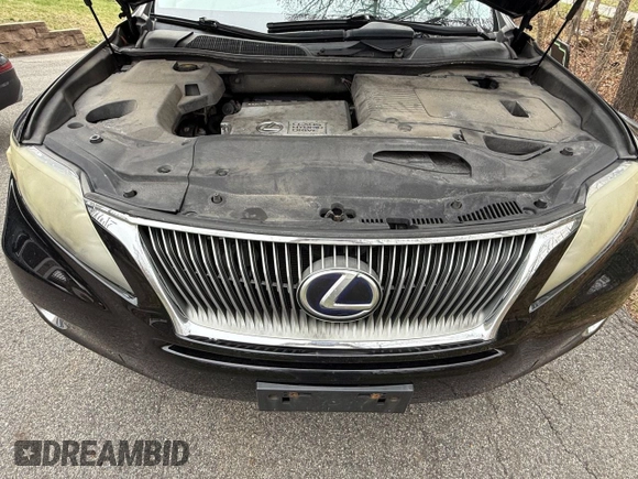 2010 Lexus RX 450h with VIN JTJBC1BA2A2412709, listed as a Copart auction lot 54962565 with 240,611 mi miles and Clean Title. Bid and sale history available at DreamBid. Image 7.