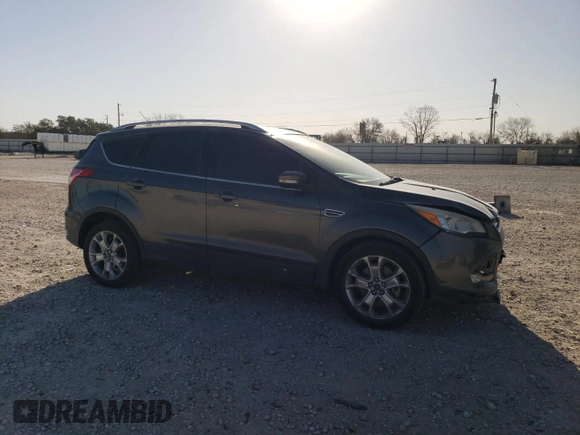 2015 Ford Escape Titanium with VIN 1FMCU0J90FUB48533, listed as a Copart auction lot 47787445 with 132,294 mi miles and Salvage Title. Bid and sale history available at carsss.com. Image 4.