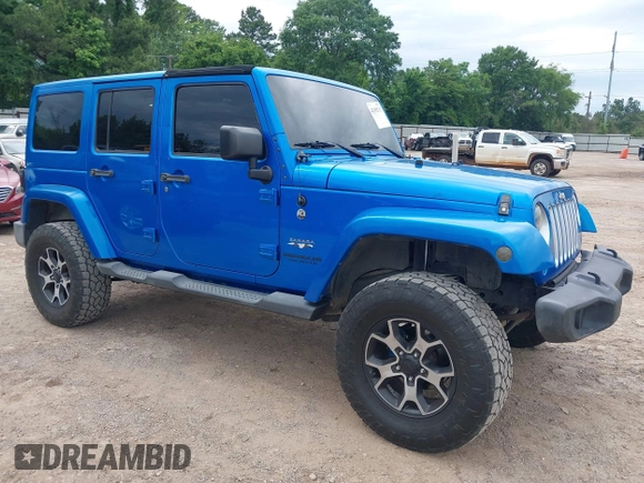 2016 Jeep Wrangler Unlimited 75th Anniversary with VIN 1C4HJWEG0GL154418, listed as a IAAI auction lot 42192717 with 102,514 mi miles and . Bid and sale history available at DreamBid. Image 1.