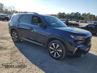 2023 Honda Pilot Touring with VIN 5FNYG2H73PB007631, listed as a Copart auction lot 82382153 with 6,050 mi miles. Bid and sale history available at carsss.com. Image 4.