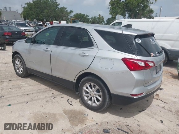 2021 Chevrolet Equinox LT z VIN 3GNAXKEV0MS165682, wystawiony jako IAAI lot #42419436 z przebiegiem 42 199 mil mil oraz . Historia ofert i sprzedaży dostępna na DreamBid. Obrazek 3.
