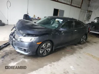 2018 Honda Civic EX-L z VIN JHMFC1F74JX029908, wystawiony jako Copart lot #54533465 z przebiegiem 99 056 mil mil oraz Szkoda całkowita • Salvage title. Historia ofert i sprzedaży dostępna na DreamBid. Obrazek 1.