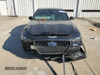 2021 Genesis G70 3.3T with VIN KMTG34LE7MU066534, listed as a Copart auction lot 77532704 with 58,951 mi miles and Salvage Title. Bid and sale history available at carsss.com. Image 5.