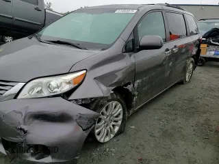 2015 Toyota Sienna XLE with VIN 5TDYK3DC6FS660035, listed as a Copart auction lot 51660075 with 176,968 mi miles and Salvage Title. Bid and sale history available at DreamBid. Image 12.