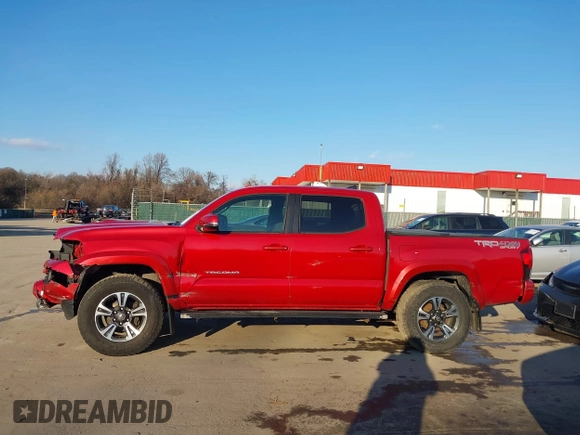 2018 Toyota Tacoma SR with VIN 3TMCZ5ANXJM154305, listed as a IAAI auction lot 41557497 with 182,624 mi miles and . Bid and sale history available at DreamBid. Image 14.