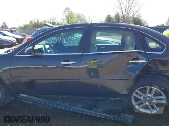 2015 Chevrolet Impala LTZ with VIN 2G1WC5E35F1142321, listed as a IAAI auction lot 42090274 with 109,972 mi miles and . Bid and sale history available at DreamBid. Image 14.
