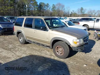 1999 Ford Explorer z VIN 1FMZU32X1XZC03794, wystawiony jako IAAI lot #41230494 z przebiegiem 265 224 mil mil oraz . Historia ofert i sprzedaży dostępna na DreamBid. Obrazek 1.