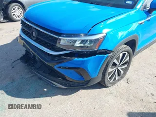 2022 Volkswagen Taos SE z VIN 3VVRX7B28NM088778, wystawiony jako IAAI lot #41624907 z przebiegiem 32 903 mil mil oraz . Historia ofert i sprzedaży dostępna na DreamBid. Obrazek 6.