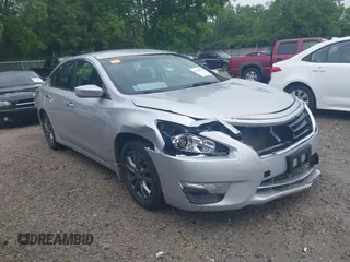 2015 Nissan Altima S z VIN 1N4AL3AP9FC599003, wystawiony jako IAAI lot #42427844 z przebiegiem 193 563 mil mil oraz . Historia ofert i sprzedaży dostępna na DreamBid. Obrazek 1.