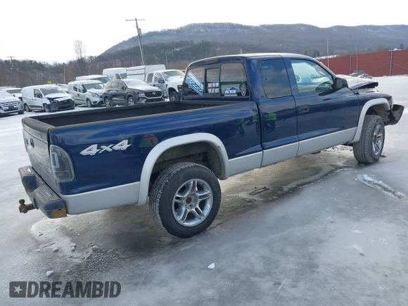 2004 Dodge Dakota SLT with VIN 1D7HG42N74S665198, listed as a IAAI auction lot 41477799 with 213,175 mi miles. Bid and sale history available at carsss.com. Image 4.