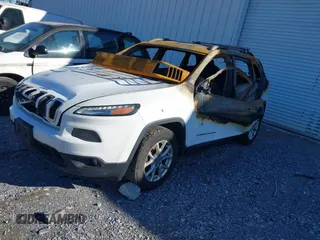 2014 Jeep Cherokee Altitude with VIN 1C4PJMCB5EW120946, listed as a IAAI auction lot 41348100 with Not Provided miles and . Bid and sale history available at DreamBid. Image 2.