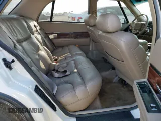 1999 Buick LeSabre Limited z VIN 1G4HR52K1XH501474, wystawiony jako Copart lot #59096715 z przebiegiem 122 857 mil mil oraz Szkoda całkowita • Salvage title. Historia ofert i sprzedaży dostępna na DreamBid. Obrazek 10.
