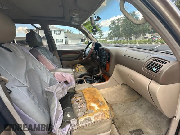 1998 Lexus LX 470 z VIN JT6HT00W7W0008417, wystawiony jako Copart lot #79324334 z przebiegiem 183 911 mil mil oraz Czysty tytuł • Clean title. Historia ofert i sprzedaży dostępna na DreamBid. Obrazek 5.