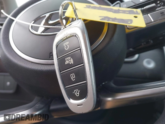 2022 Hyundai Tucson SEL z VIN 5NMJBCAE3NH070531, wystawiony jako IAAI lot #41222494 z przebiegiem 91 358 mil mil oraz . Historia ofert i sprzedaży dostępna na DreamBid. Obrazek 11.