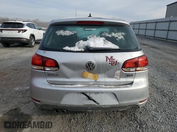 2013 Volkswagen Golf TDI w/Sunroof & Nav z VIN WVWNM7AJ2DW130973, wystawiony jako Copart lot #42105645 z przebiegiem 162 232 mil mil oraz Szkoda całkowita • Salvage title. Historia ofert i sprzedaży dostępna na DreamBid. Obrazek 6.