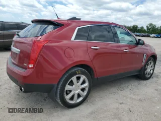 2014 Cadillac SRX Premium Collection z VIN 3GYFNDE33ES571840, wystawiony jako Copart lot #56823845 z przebiegiem 139 686 mil mil oraz Szkoda całkowita • Salvage title. Historia ofert i sprzedaży dostępna na DreamBid. Obrazek 3.